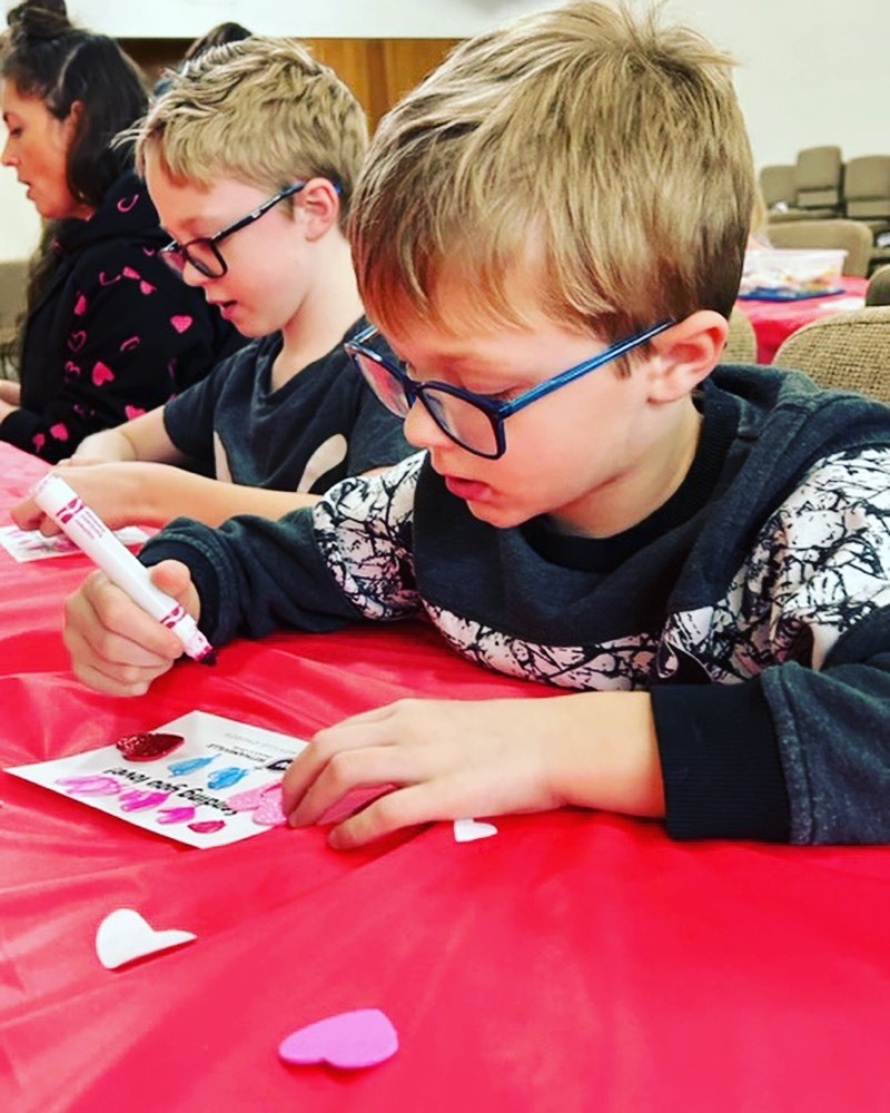 Two little boys coloring